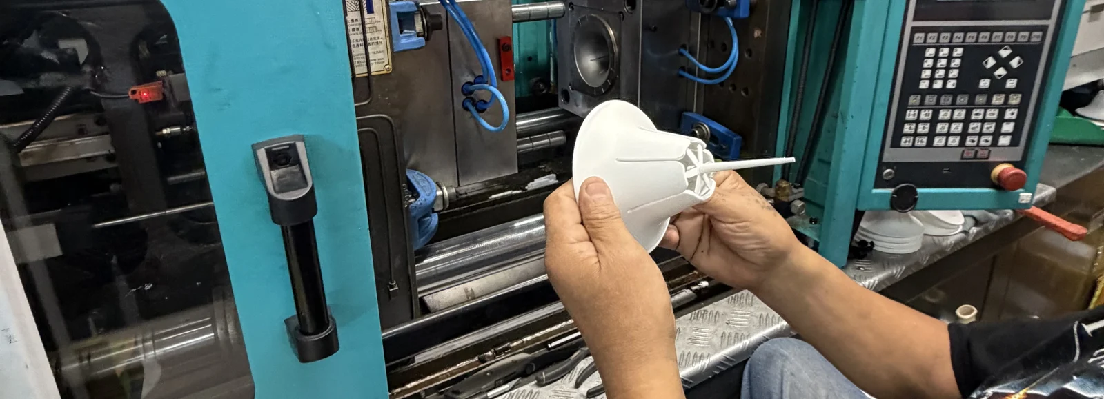 An operator inspecting a Steadi during actual manufacturing
